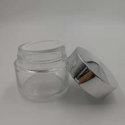MSDS Lọ kem thủy tinh trong suốt 100g có nắp bạc sáng bóng Bùn mặt nạ nắp trắng