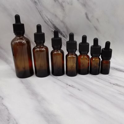 Chai mỹ phẩm thủy tinh 100ml màu hổ phách Chai nhỏ giọt Ratchet Đóng cửa Bảo vệ trẻ em