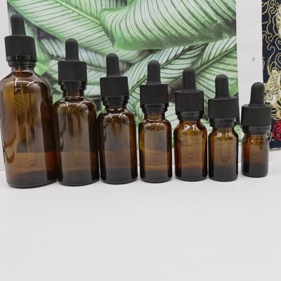 Chai mỹ phẩm thủy tinh 100ml màu hổ phách Chai nhỏ giọt Ratchet Đóng cửa Bảo vệ trẻ em